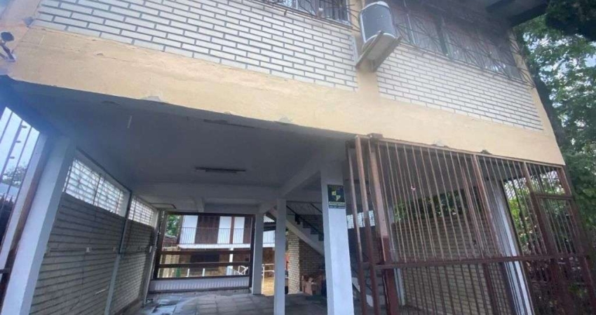 Sobrado com 3 dormitórios para alugar, 170 m² por R$ 4.784/mês - Dom Feliciano - Gravataí/RS