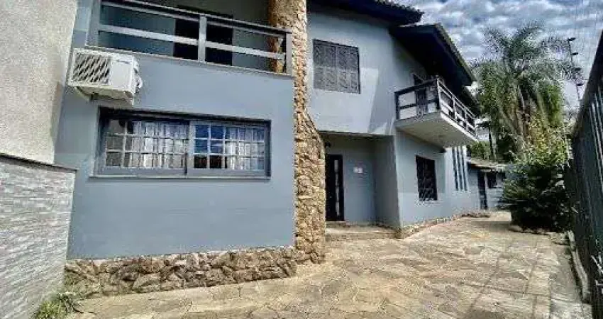 Sobrado com 3 dormitórios para alugar, 150 m² por R$ 4.155,00/mês - Dom Feliciano - Gravataí/RS