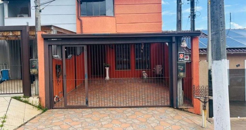 Sobrado com 3 dormitórios para alugar, 130 m² por R$ 4.305,00/mês - Bela Vista - Gravataí/RS