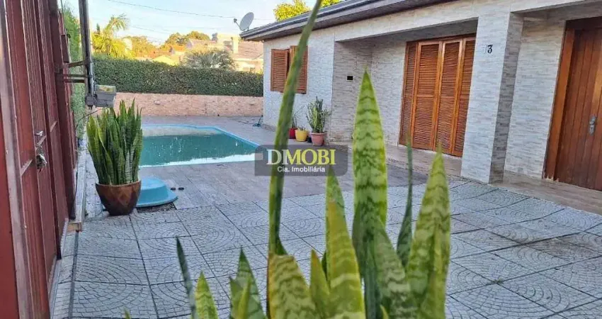 Casa com 2 dormitórios à venda, 63 m² por R$ 425.000,00 - Parque Jaqueline - Gravataí/RS