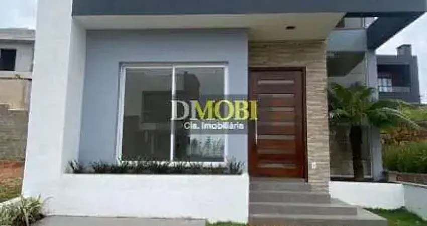 Sobrado com 3 dormitórios à venda, 147 m² por R$ 850.000,00 - Condomínio Primavera - Gravataí/RS