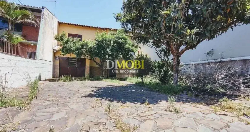 Sobrado com 4 dormitórios para alugar, 155 m² por R$ 3.270,00/mês - Centro - Gravataí/RS