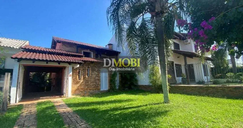 Sobrado com 3 dormitórios para alugar, 220 m² por R$ 6.753,00/mês - Centro - Gravataí/RS