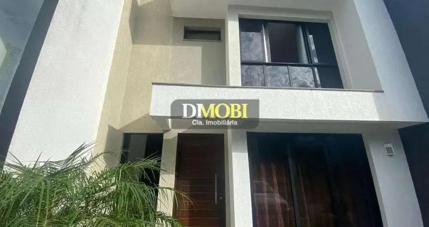 Sobrado com 3 dormitórios para alugar, 112 m² por R$ 6.735,00/mês - Primavera - Gravataí/RS