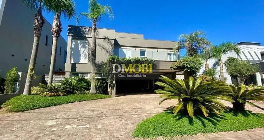Sobrado com 3 dormitórios para alugar, 393 m² por R$ 25.428,52/mês - Alphaville - Gravataí/RS