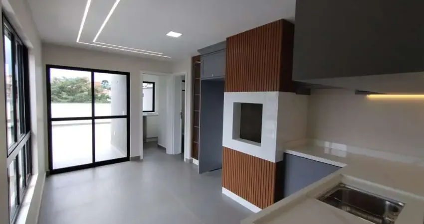 Apartamento duplex novo com móveis planejados, 3 quartos, churrasqueira e 2 vagas de garagem cobert