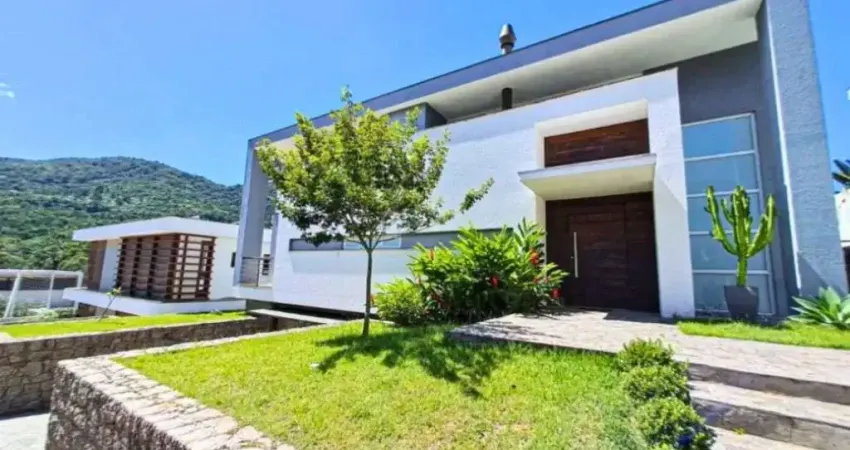 Casa com 4 dormitórios, 344 m² - venda por R$ 3.900.000 ou aluguel por R$ 21.698/mês - Itacorubi - Florianópolis/SC