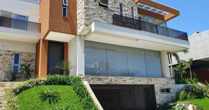 Casa em condomínio fechado com 5 quartos à venda na Estrada Haroldo Soares Glavan, 4690, Cacupé, Florianópolis