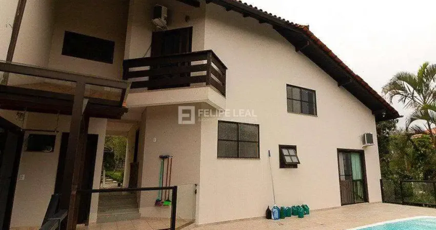 Casa em condomínio fechado com 6 quartos à venda na Estrada Haroldo Soares Glavan, 1950, Cacupé, Florianópolis