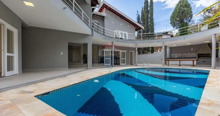 Re/max vende luxuosa casa em condomínio- vinhedo: 5 suítes, piscina, lazer.