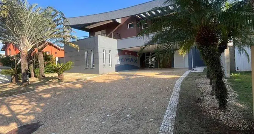 Re/max aluga casa com 520 m², 5 quartos com ar condicionado (sendo 4 suites - 1 master e 1 no térreo), piscina e área gourmet no alphaville campinas.