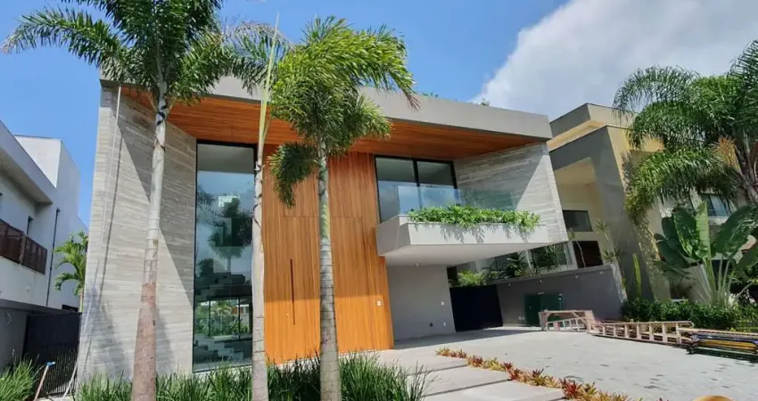 Mansão de 852m², contemporânea, 5 suítes, triplex, piscina e spa, possibilidade mobiliada, na barra da tijuca.