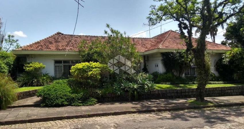 Casa com 6 quartos à venda na Travessa Trindade, 130, Jardim Lindóia, Porto Alegre