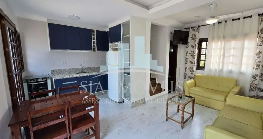 Sobrado a venda no Centro de Bertioga – 1 quadra da Praia da Enseada, 2 suites, 1 vaga de garagem, quintal com churrasqueira.