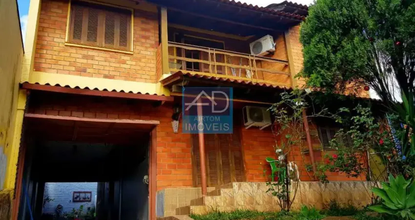 Casa com 5 quartos à venda na Rua Araranguá, 382, COHAB A, Gravataí