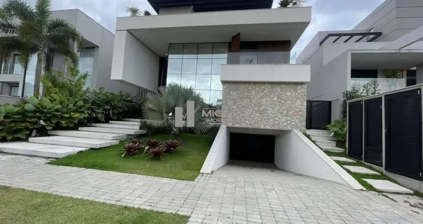 Casa triplex a venda no condomínio alphaville de alto padrão e sofisticação com 5 suítes e espaço para 6 vagas de garagem com uma infraestrutura impecável - barra da tijuca