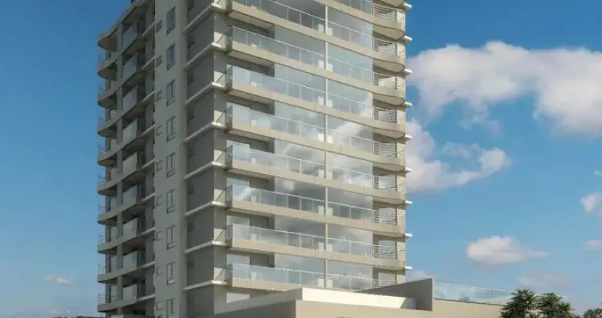 Apartamento lateral em edifício frente mar na praia central