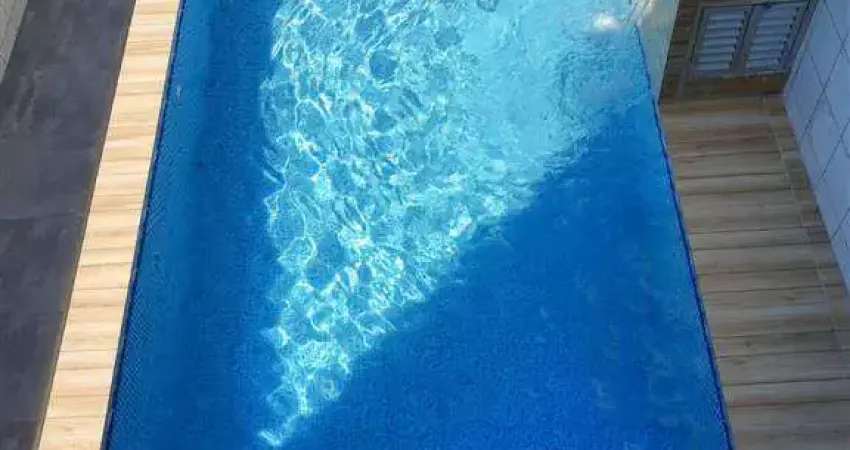 Belíssima casa com piscina e edicula na mirim, fino acabamento por r$720.000,00 aceita financiamento bancário