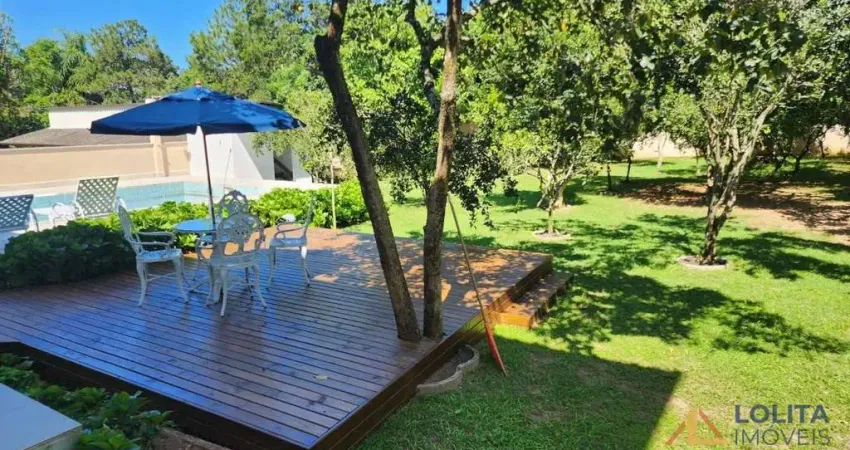 Casa à venda em Imbituba/SC,  com 3 suítes e 4 vagas de garagem