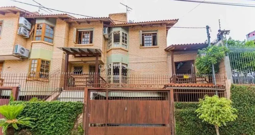 Casa com 3 quartos à venda na Rua Heitor Manganelli, 393, Jardim Itu Sabará, Porto Alegre
