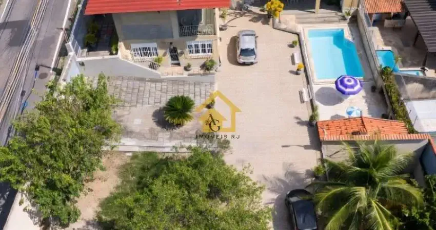 Casa à venda no Jardim Guanabara-RJ: 4 quartos, 2 suítes, área de lazer completa e mais de 6 vagas de garagem! Acesse agora!