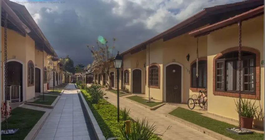 Casa térrea em village com 2 quartos, 56m² por r$ 520.000 - maitinga, bertioga/sp - stenzel imóveis