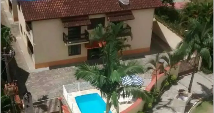 Casa em village com 2 quartos, 64m² por r$ 450.000 - maitinga, bertioga/sp - stenzel imóveis