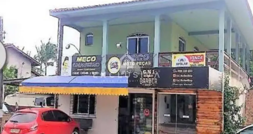 Duas salas comercias + uma kitnet + um apartamento no andar de cima.