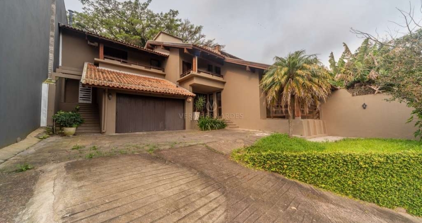 Casa com 3 quartos à venda na Rua Edgar Luiz Schneider, 510, Jardim Isabel, Porto Alegre