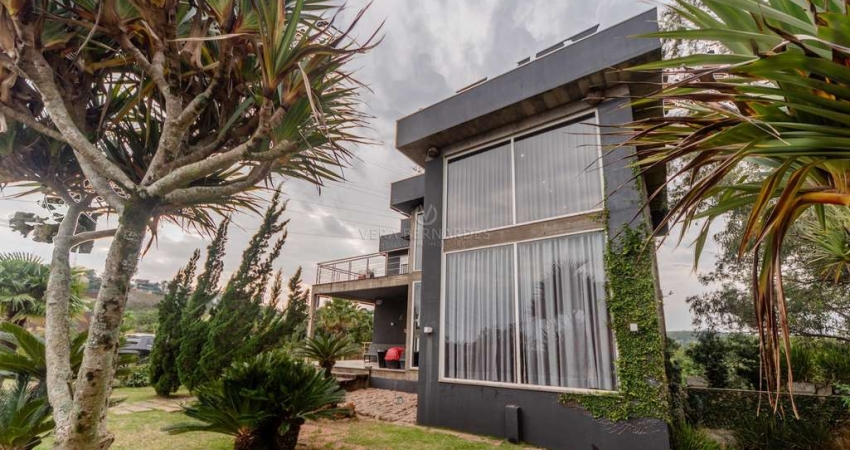Casa em condomínio fechado com 4 quartos à venda na Rua Bertha Loforte Gonçalves, --, Vila Nova, Porto Alegre