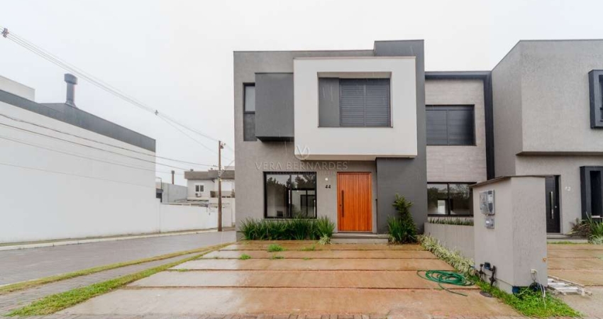 Casa em condomínio fechado com 3 quartos à venda na Rua Jean Vardaramatos, 130, Hípica, Porto Alegre