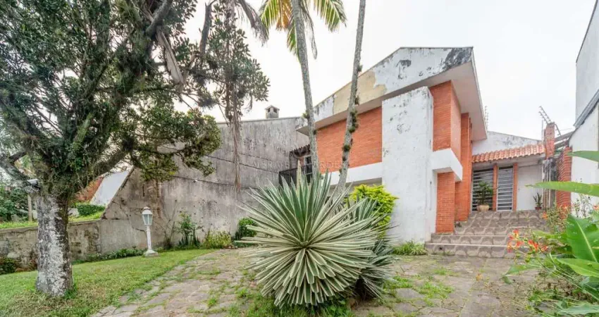 Casa com 4 quartos à venda na Rua Jacundá, --, Guarujá, Porto Alegre