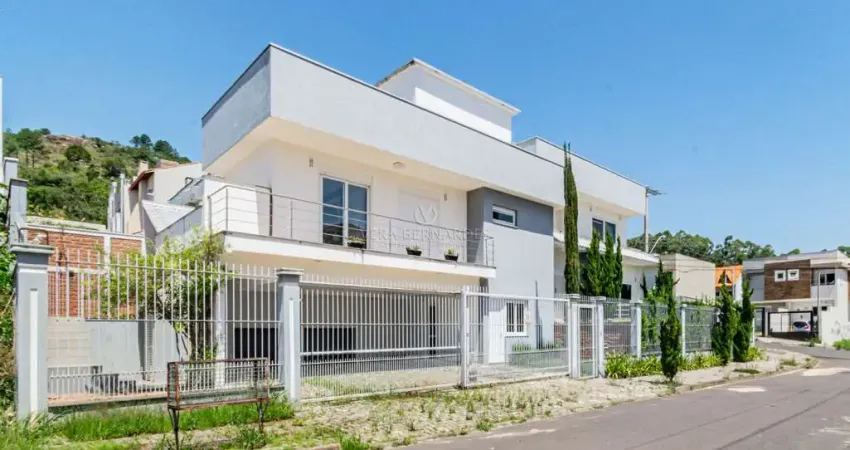 Casa com 4 quartos à venda na Rua Irmão Jaime Biazus, --, Guarujá, Porto Alegre
