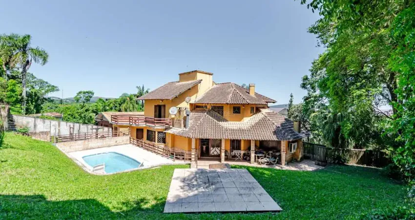 Casa com 4 quartos à venda na Avenida Coronel Marcos, --, Pedra Redonda, Porto Alegre