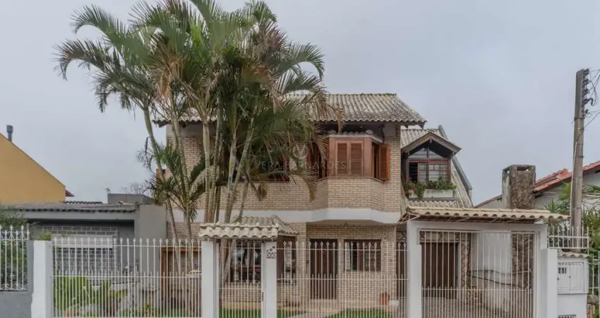 Casa com 4 quartos à venda na Avenida Guarujá, 115, Guarujá, Porto Alegre
