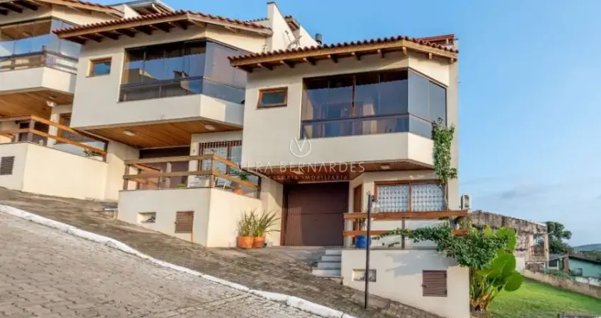 Casa em condomínio fechado com 3 quartos à venda na Rua Alcebíades Antônio dos Santos, --, Nonoai, Porto Alegre