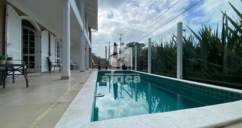 Guaratuba, residência com piscina aquecida, 4 quartos sendo 2 suítes, 4 vagas de garagem, próxima da praia central, guaratuba/pr - imobiliária áfrica, centro, guaratuba - pr