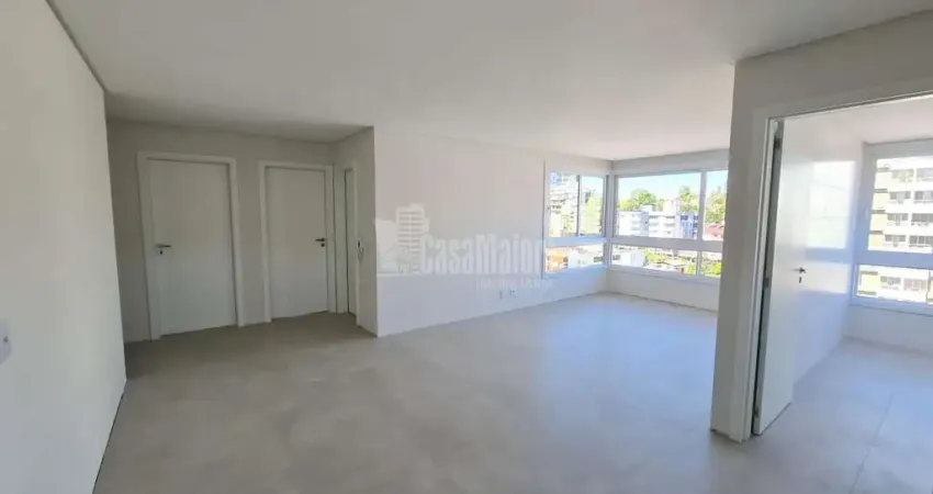 Apartamento central de 02 dormitórios com suíte e 01 vaga de garagem