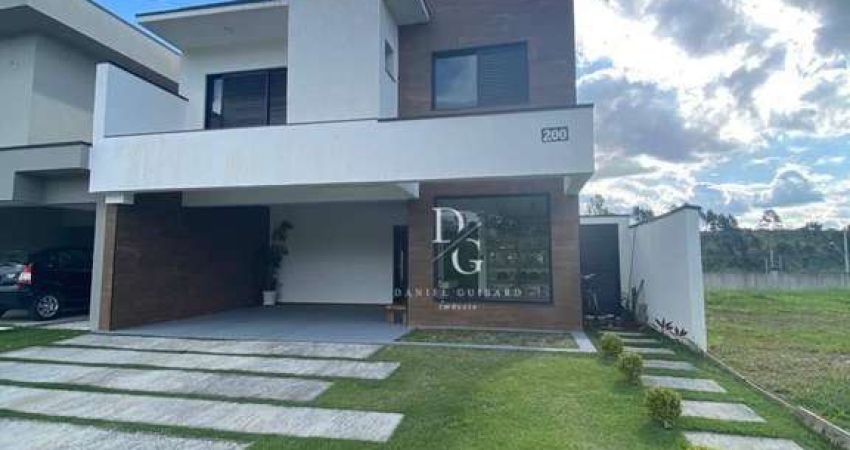 Casa com 3 dormitórios à venda, 202 m² por R$ 870.000,00 - Condomínio Vale dos Cristais - Taubaté/SP