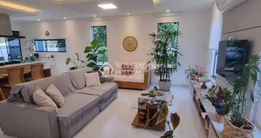 Casa em condomínio fechado com 4 quartos à venda na Rua Leonel Pereira, 2033, Cachoeira do Bom Jesus, Florianópolis