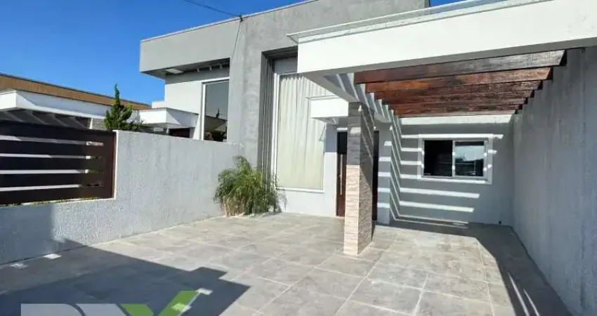 Casa geminada de alto padrão com 02 dormitórios no centro de imbé