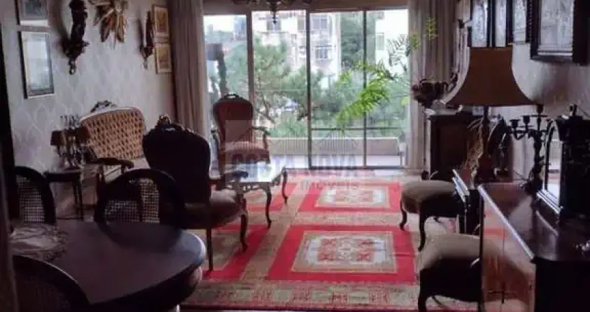 Apartamento espaçoso de 3 quartos e 2 banheiros, com varanda e uma ampla sala para dois ambientes.
