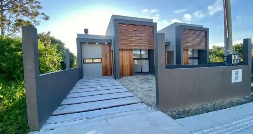 A venda linda casa nova com arquitetura moderna e conforto completo, 02 dormitórios sendo 1 suite.