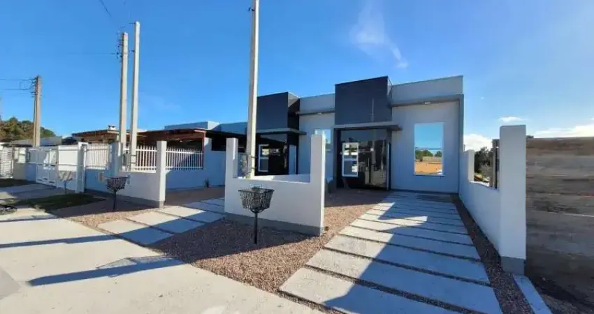 Venda de linda casa geminada com 2 doritórios no centro de imbé !