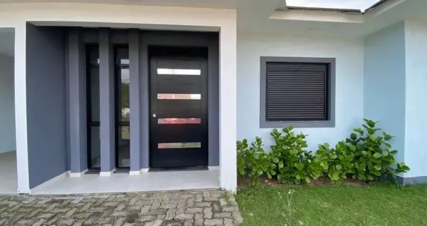 Venda de linda casa com 3 dormitórios e uma linda suíte em nova tramandaí.