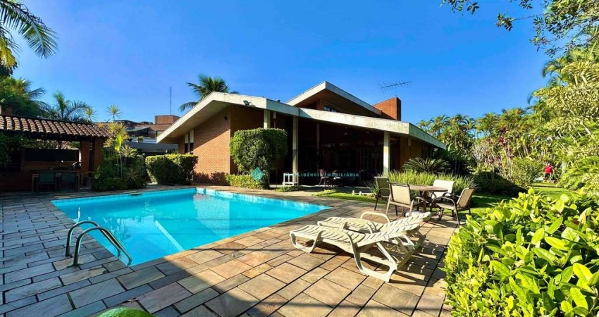 Casa à venda em condomínio fechado na Praia da Enseada, Guarujá, SP | Qvista inteligência Imobiliár