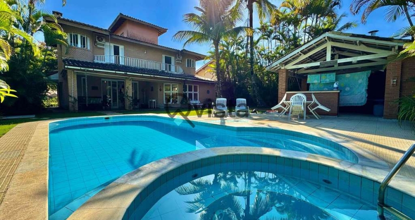 Casa à venda em condomínio fechado na Praia da Enseada, Guarujá, SP | Qvista inteligência Imobiliár
