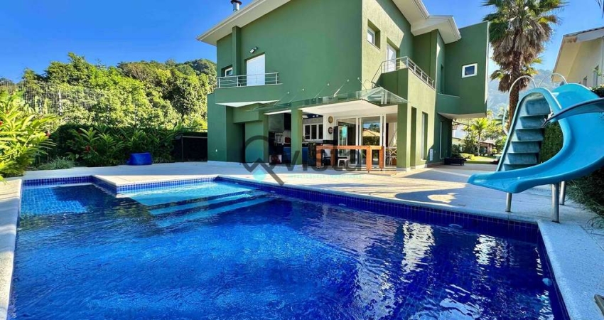 Casa moderna à venda em condomínio fechado na Praia da Enseada, Guarujá, SP | Qvista inteligência I