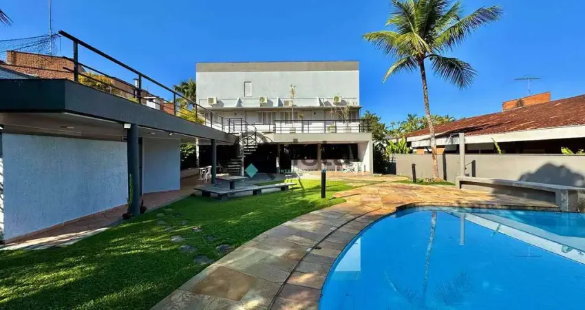Casa à venda em condomínio fechado na Praia da Enseada, Guarujá, SP | Qvista inteligência Imobiliár