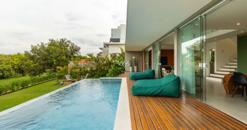 Casa pé no lago em condomínio à venda no condomínio Palmeiras Imperiais em Salto, 3 suítes e 600m² de terreno
